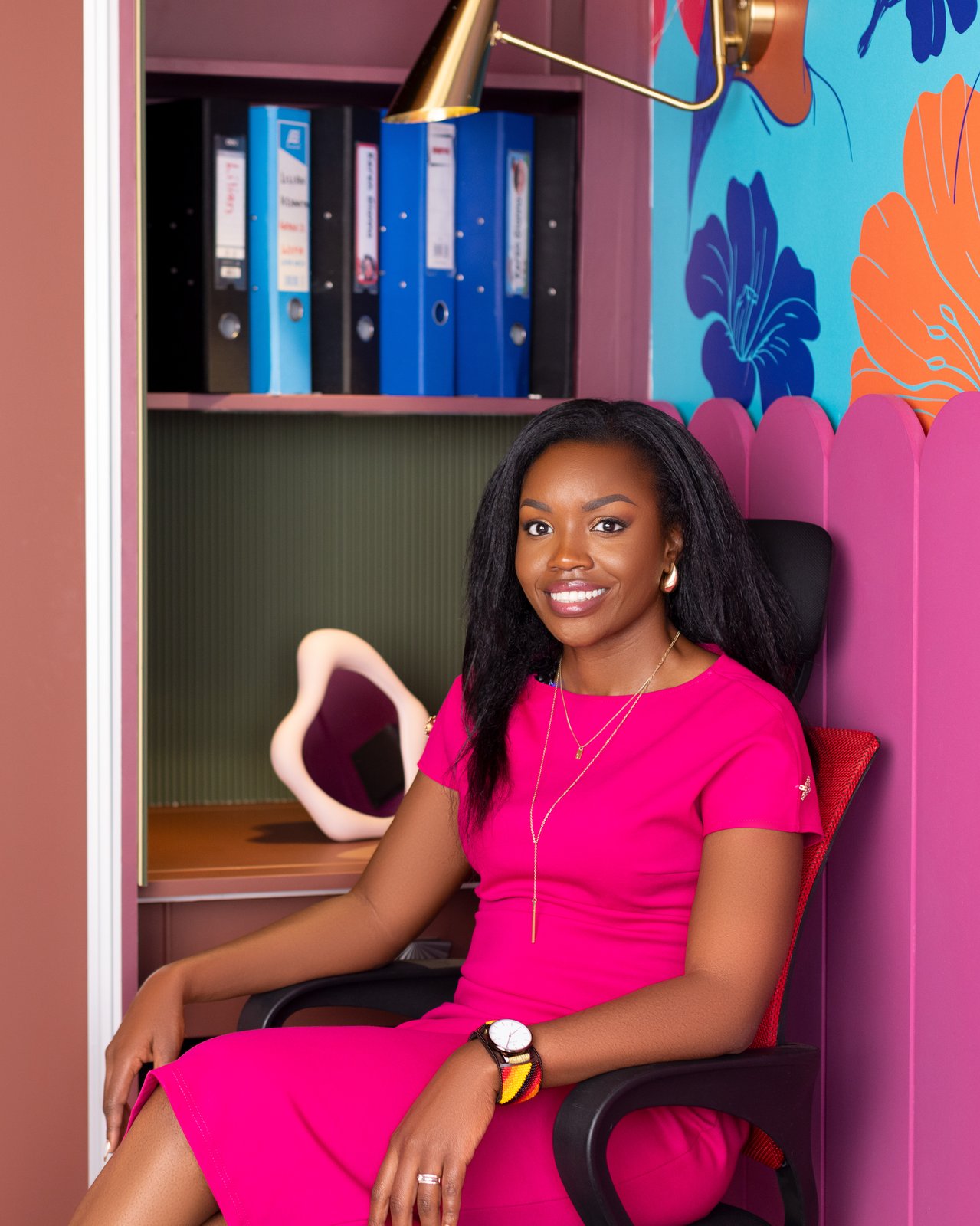 Tina Kwamboka, Founder of Yaara Design Studio, relaxing in a lifestyle setting