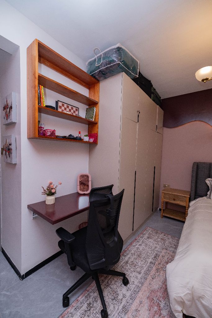 Built-in study nook beside a bedroom wardrobe, Nairobi family residence